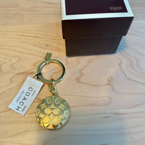 Coach keychain NWT - gold locket